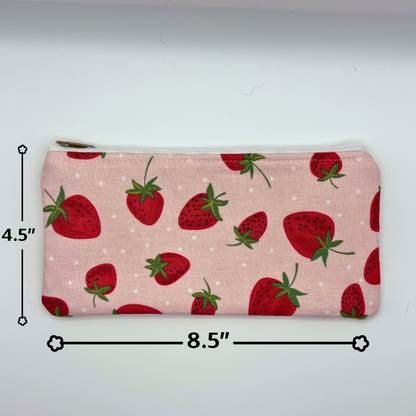 Pouch with strawberry pattern and measurements on a white background
